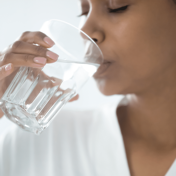 woman drinking clean water free of legionella